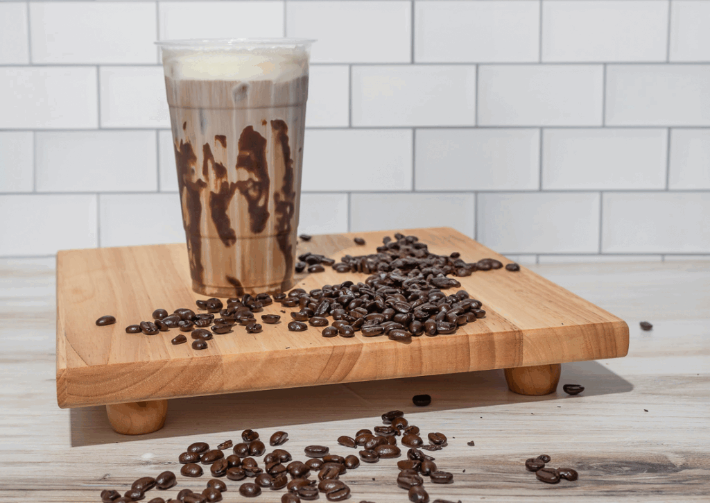 Iced coffee topped with Rubix Foods cold foam.